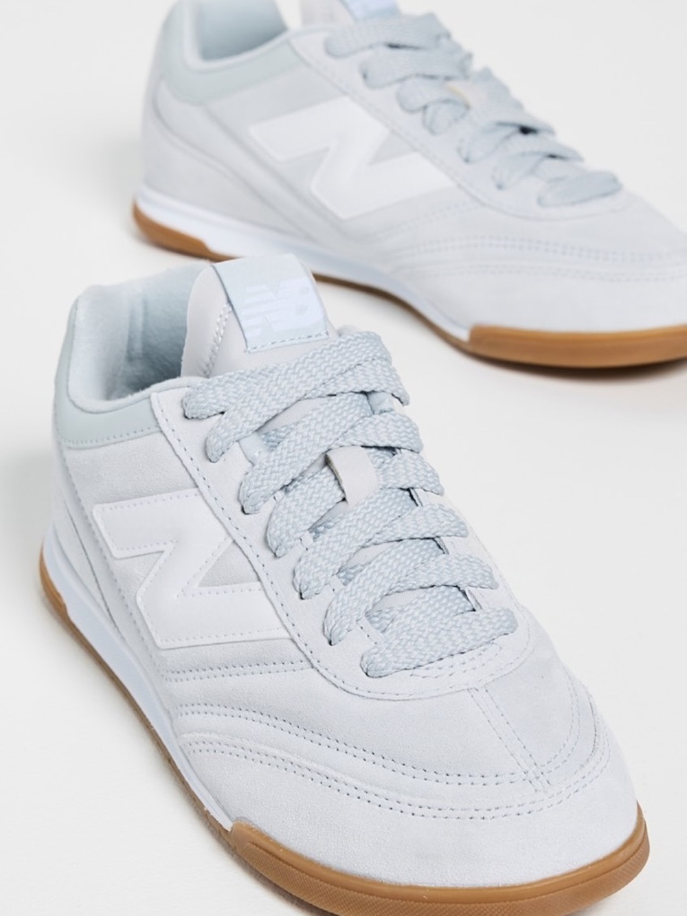 New Balance Light Blue Suede Sneakers with Gum Outsole